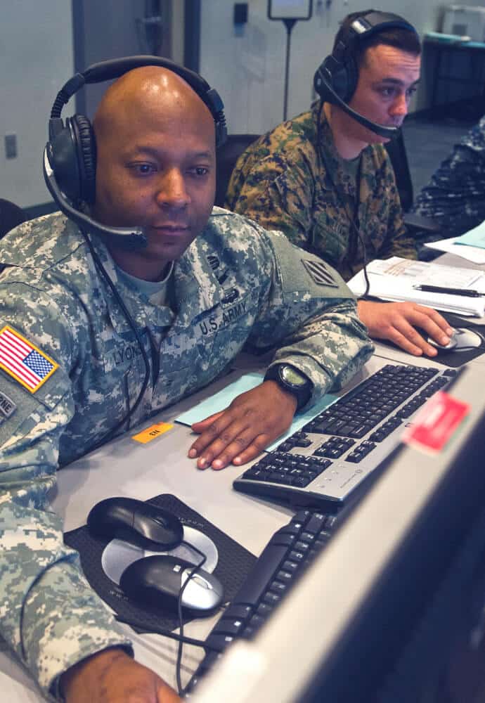 military working on a laptop